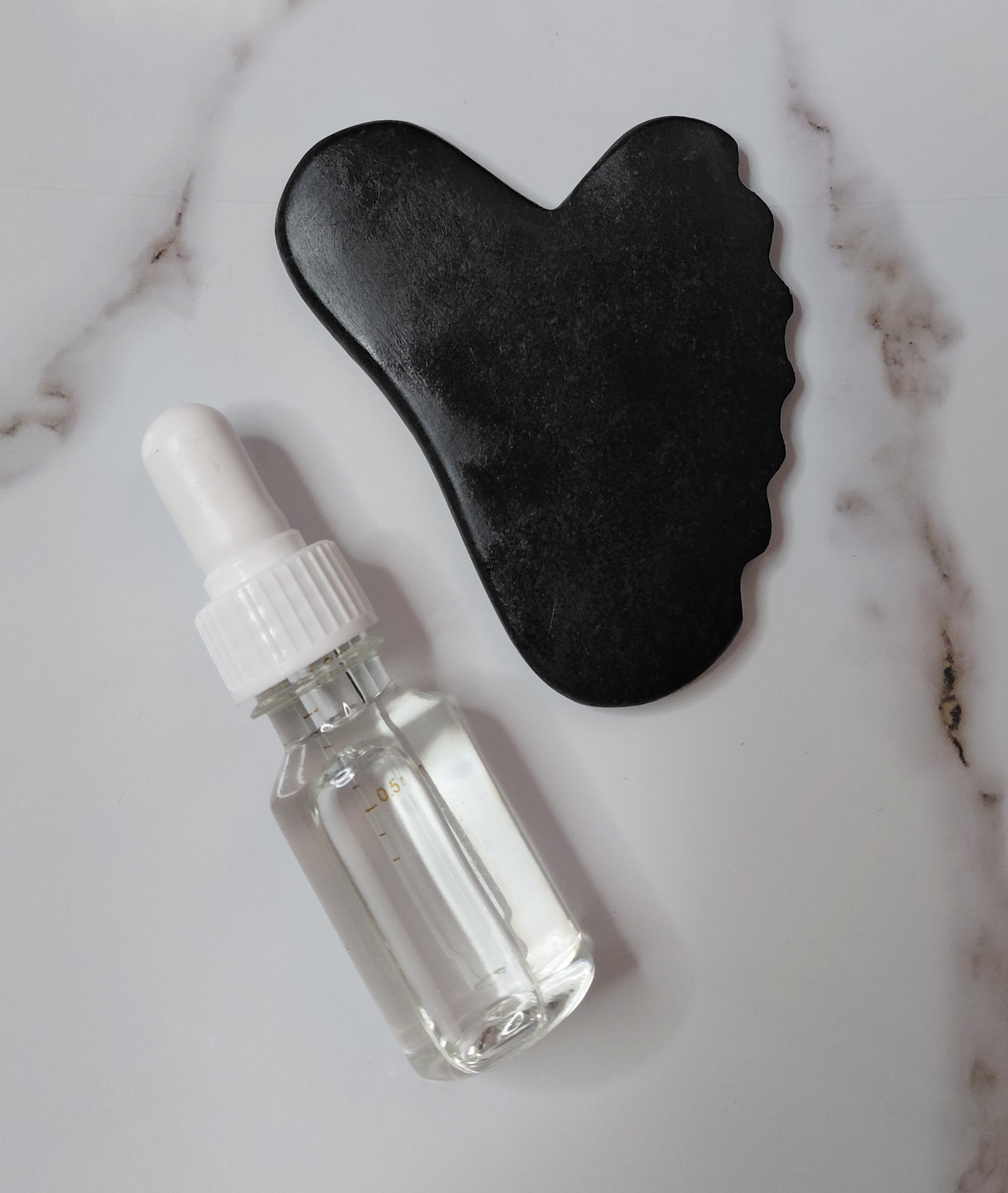 سنگ گواشا دندانه دار همراه روغن مخصوص ماساژ