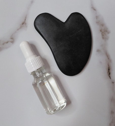 سنگ گواشا ساده همراه روغن ماساژ