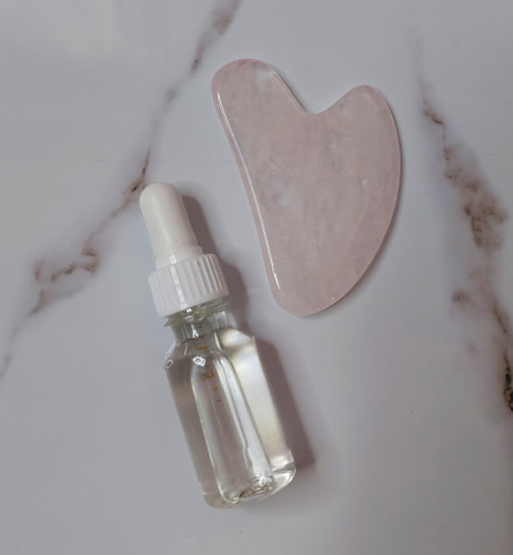 سنگ گواشا رزکوارتز همراه روغن ماساژ